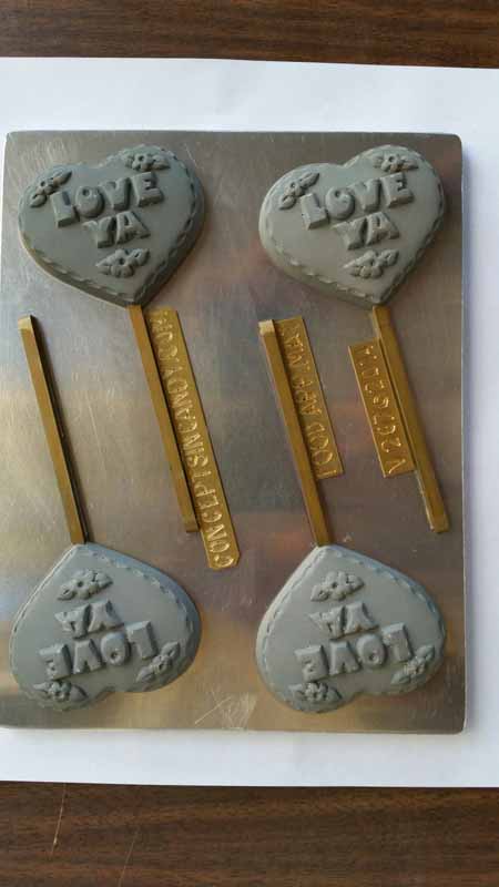 Molde para caramelos de chocolate, piruleta - Amor, corazón mediano con la frase "LOVE YA"