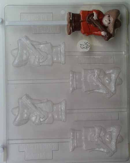 Chocolate// Candy Mold, Lollipop - Quince, Boy in Tradition Clothing Playing Guitar